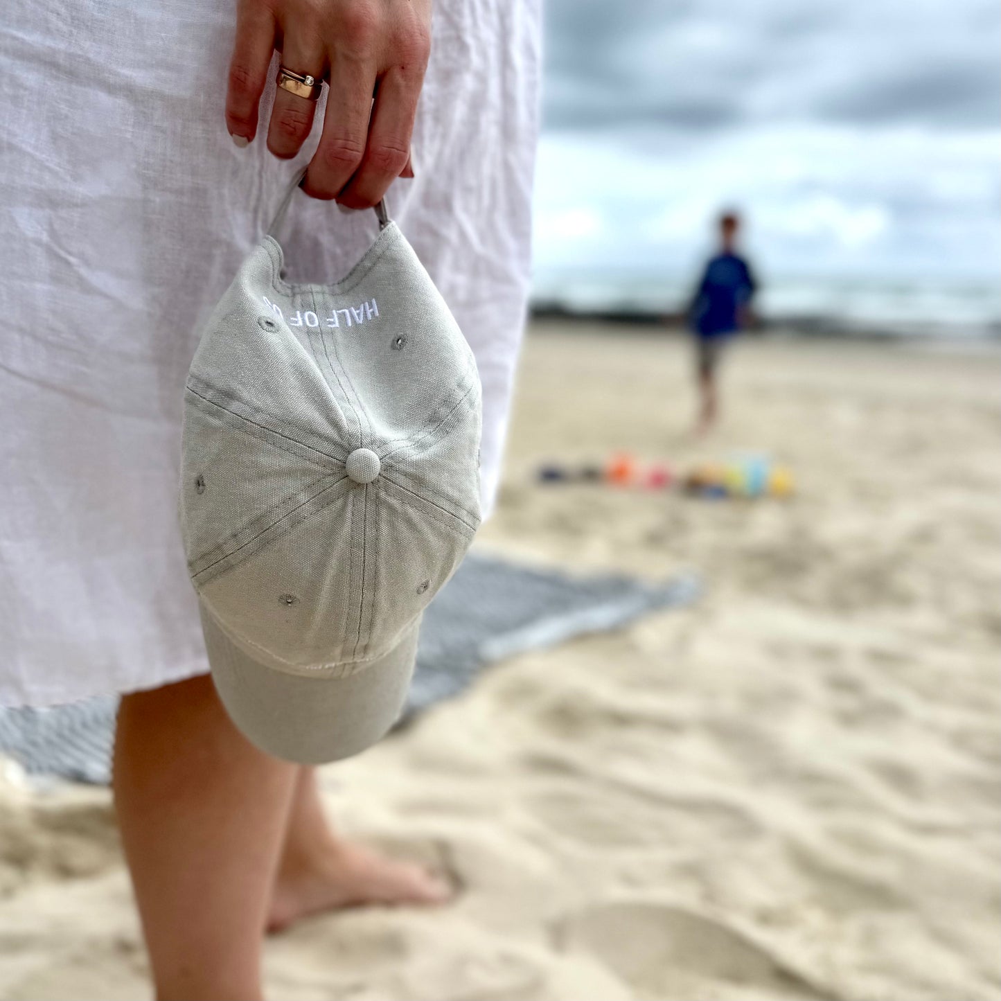 'it begins and ends with half of us' cap