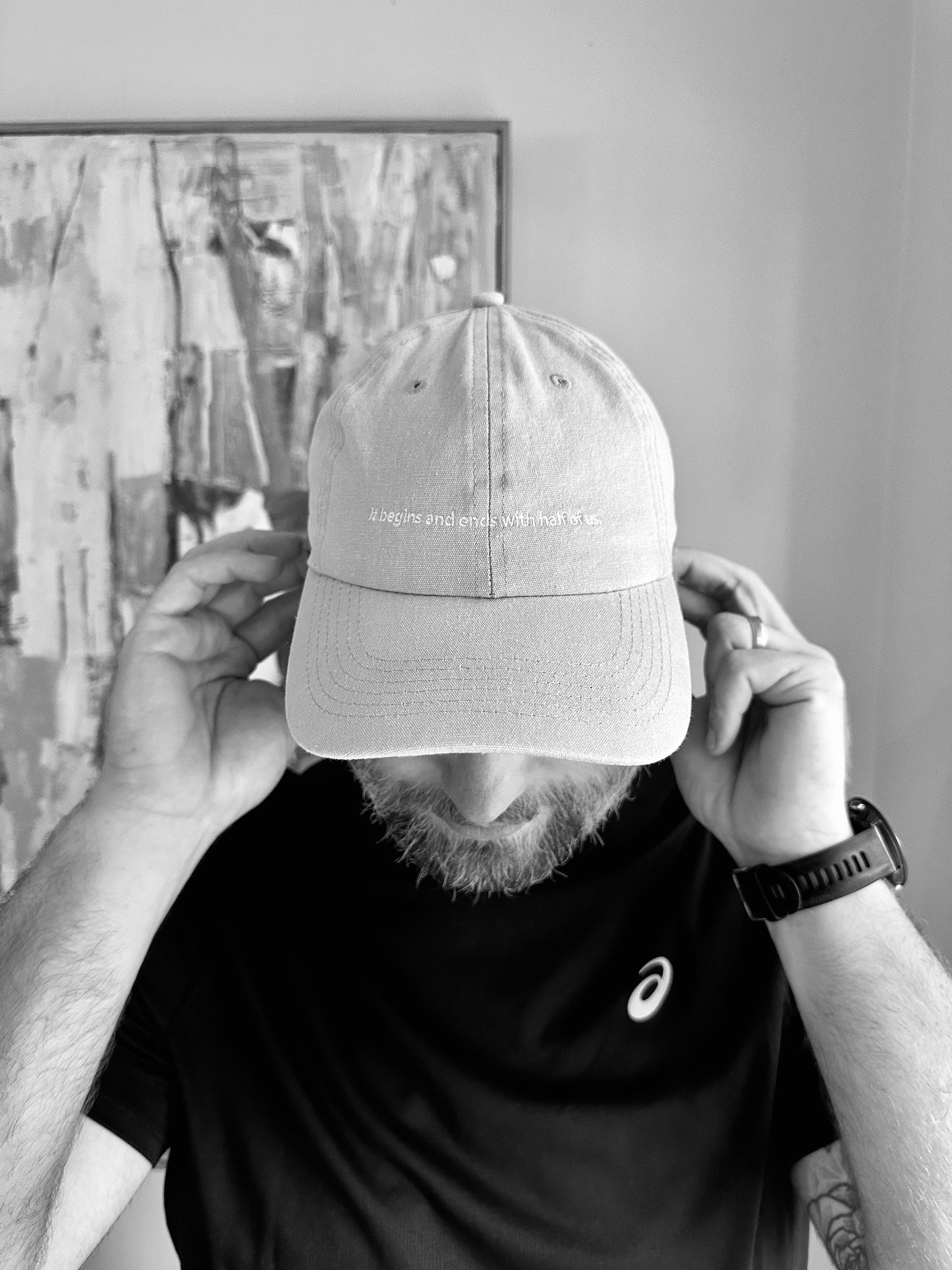 'it begins and ends with half of us' cap