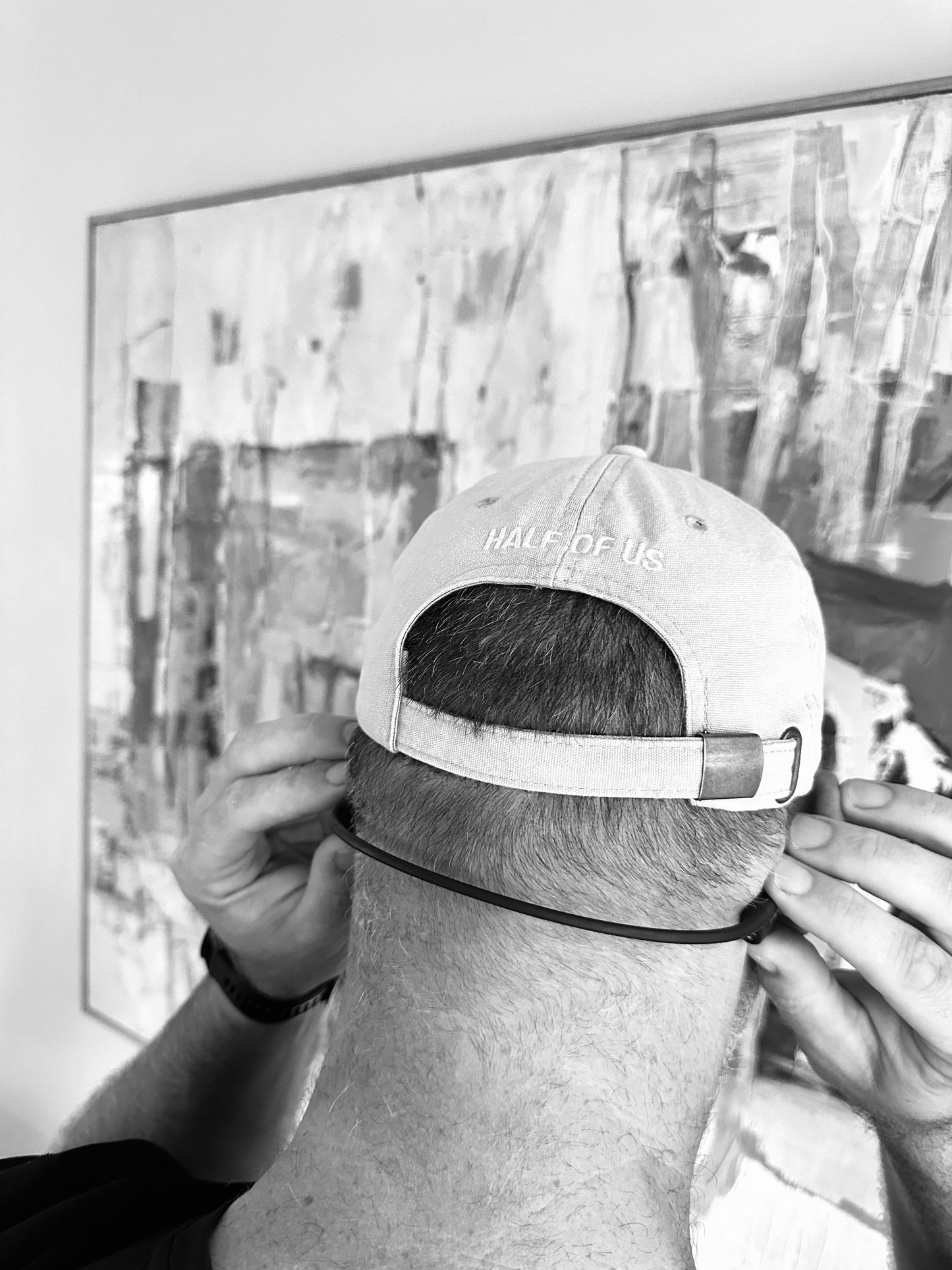 'it begins and ends with half of us' cap